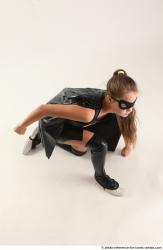 Naty BATGIRL KNEELING POSE